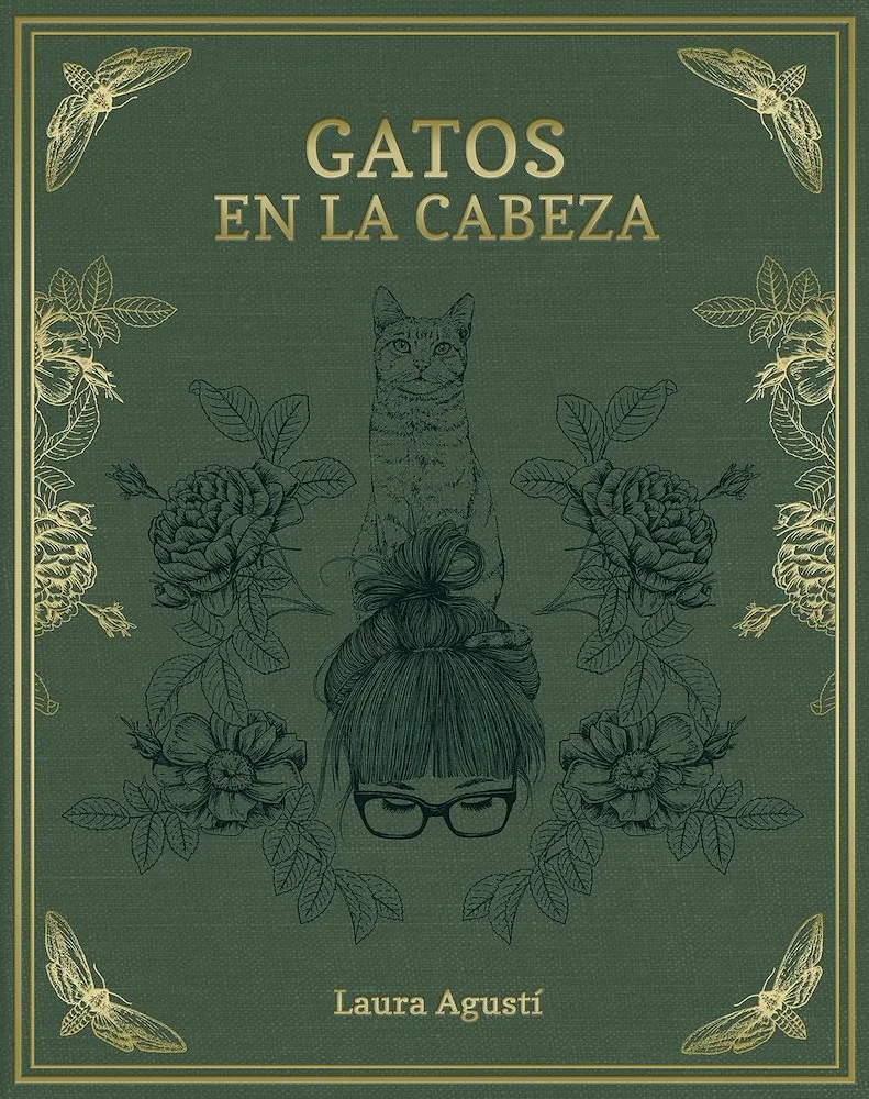 Gatos en la cabeza